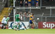 28 May 2017; Eóin Cleary of Clare shoots to score his side's first goal past Limerick goalkeeper Donal O'Sullivan during the Munster GAA Football Senior Championship Quarter-Final between Clare and Limerick at Cusack Park in Ennis, Co. Clare. Photo by Diarmuid Greene/Sportsfile