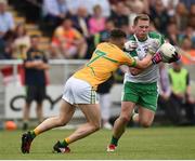 28 May 2017; Liam Gavaghan of London in action against Oisín Madden of Leitrim during the Connacht GAA Football Senior Championship Quarter-Final match between London and Leitrim at McGovern Park, in Ruislip, London, England.   Photo by Seb Daly/Sportsfile