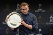 28 May 2017; Jockey Ryan Moore celebrates with the trophy after winning Tattersalls Irish 1,000 Guineas on Winter at Tattersalls Irish Guineas Festival at The Curragh, Co Kildare. Photo by Cody Glenn/Sportsfile