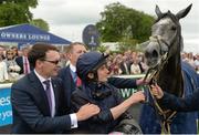 28 May 2017; Trainer Aidan O'Brien with jockey Ryan Moore after sending out Winter to win the Tattersalls Irish 1,000 Guineas at Tattersalls Irish Guineas Festival at The Curragh, Co Kildare. Photo by Cody Glenn/Sportsfile