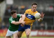 28 May 2017; Eóin Cleary of Clare in action against Iain Corbett of Limerick during the Munster GAA Football Senior Championship Quarter-Final between Clare and Limerick at Cusack Park in Ennis, Co. Clare. Photo by Diarmuid Greene/Sportsfile