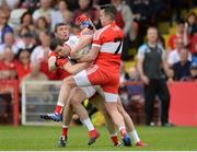 28 May 2017; Sean Cavanagh of Tyrone in action against Ciaran McFaul and Carlus McWilliams of Derry  during the Ulster GAA Football Senior Championship Quarter-Final match between Derry and Tyrone at Celtic Park, in Derry.  Photo by Oliver McVeigh/Sportsfile