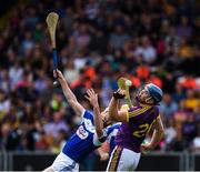 28 May 2017; Jack Guiney of Wexford in action against Leigh Bergin of Laois during the Leinster GAA Hurling Senior Championship Quarter-Final match between Laois and Wexford at O'Moore Park, in Portlaoise, Co. Laois. Photo by Ray McManus/Sportsfile
