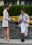 28 May 2017; Jockey Chris Hayes in conversation with a racegoer during Tattersalls Irish Guineas Festival at The Curragh, Co Kildare. Photo by Cody Glenn/Sportsfile