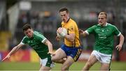 28 May 2017; Eóin Cleary of Clare in action against Iain Corbett, left, and Sean O'Dea of Limerick during the Munster GAA Football Senior Championship Quarter-Final between Clare and Limerick at Cusack Park in Ennis, Co. Clare. Photo by Diarmuid Greene/Sportsfile