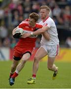 28 May 2017; Brendan Rogers of Derry in action against Hugh Pat McGeary of Tyrone during the Ulster GAA Football Senior Championship Quarter-Final match between Derry and Tyrone at Celtic Park, in Derry.  Photo by Oliver McVeigh/Sportsfile