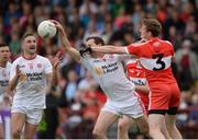 28 May 2017; Colm Cavanagh of Tyrone in action against Brendan Rogers of Derry during the Ulster GAA Football Senior Championship Quarter-Final match between Derry and Tyrone at Celtic Park, in Derry. Photo by Oliver McVeigh/Sportsfile