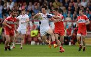 28 May 2017; Matthew Donnelly of Tyrone in action against Christopher McKaigue of Derry during the Ulster GAA Football Senior Championship Quarter-Final match between Derry and Tyrone at Celtic Park, in Derry. Photo by Oliver McVeigh/Sportsfile