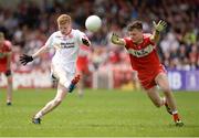 28 May 2017, Peter Og McCartan of Tyrone in action against Dara Rafferty of Derry during the Electric Ireland GAA Ulster GAA Football Minor Championship Quarter-Final game between Derry and Tyrone at Celtic Park, in Derry. Photo by Oliver McVeigh/Sportsfile