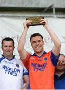 28 May 2017; St Patrick's captain Eoghan O'Mahony lifts the shield after the Leinster Adult Club Hurling League Division 4 Final match between Ballyboden St Enda's and St Patrick's at O'Connor Park in Tullamore, Co Offaly. Photo by Piaras Ó Mídheach/Sportsfile