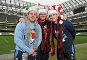 16 December 2011; There will be a Christmas party atmosphere with a record breaking Heineken Cup pool match crowd of over 46,000 people in the Aviva stadium on Saturday evening when Leinster take on Bath. Leinster fans are being asked to wear Christmas jumpers and Santa hats and get in the charity spirit and help raise essential funds for Leinster’s five charities – Welcome Home, Barretstown, Bray Lakers, Action Breast Cancer and St John Ambulance. Tickets for the match are still available from www.leinsterrugby.ie. Pictured getting in the festive spirit are leinster stars, from left to right, Sean Cronin, Nathan White and Shane Jennings whose jumpers were supplied by One4all christmasjumperday.com. Aviva Stadium, Lansdowne Road, Dublin. Picture credit: Brendan Moran / SPORTSFILE