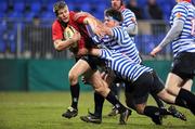 16 December 2011; Bernard Smyth, Old Belvedere, is tackled by Tyrone Moran and Jan Simon Byrne, Blackrock College. Leinster Senior League Cup Final, Blackrock College v Old Belvedere, Donnybrook Stadium, Donnybrook, Dublin. Picture credit: Matt Browne / SPORTSFILE