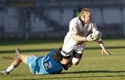 16 December 2011; Tom Court, Ulster, is tackled by Gabriel Pizarro, Aironi. Heineken Cup, Pool 4, Round 4, Aironi v Ulster, Stadio Brianteo, Monza, Italy. Picture credit: SPORTSFILE