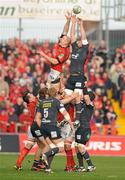 18 December 2011; Paul O'Connell, Munster, contests a line-out with Rob McCusker, Scarlets. Heineken Cup, Pool 1, Round 4, Munster v Scarlets, Thomond Park, Limerick. Picture credit: Diarmuid Greene / SPORTSFILE