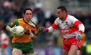 19 July 1998, Brendan Devenney Donegal in action against Gary Coleman Derry, Ulster Football Championship Final,   Clones. Picture Credit: Matt Browne/SPORTSFILE