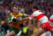 19 July 1998. Tony Boyle Donegal in action against Sean Martin Lockhart Derry. Ulster Football Final, Derry v Donegal, Clones. Picture Credit Matt Browne/SPORTSFILE