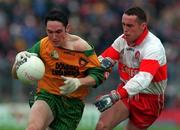 19 July 1998: Brendan Devenney, Donegal is tackled by Gary Coleman Derry. Ulster Football Final Derry v Donegal at St. Tighearnach's Park Clones. Picture Credit Matt Browne SPORTSFILE.
