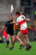 19 July 1998: Linesman Pat McEneaney draws the Referee Jim Curran's attention to a tussle between Tony Boyle Donegal and Sean Martin Lockhart Derry. Ulster Football Final. Picture Credit: Matt Browne/SPORTSFILE