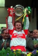 19 July 1998. Derry Captain Kieran McKeever lifts the cup after the game. Ulster Football Final, Derry v Donegal, Clones. Picture Credit Matt Browne/SPORTSFILE