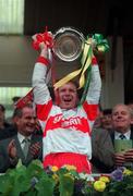 19 July 1998. Derry Captain Kieran McKeever lifts the cup after the game. Ulster Football Final, Derry v Donegal, St Tighearnach's Park, Clones. Picture credit; Matt Browne/ SPORTSFILE
