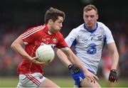 27 May 2017; Tomas Clancy of Cork in action against Ray O'Ceallaigh of Waterford during the Munster GAA Football Senior Championship Quarter-Final match between Waterford and Cork at Fraher Field in Dungarvan, Co Waterford. Photo by Matt Browne/Sportsfile