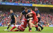 27 May 2017; Jaco Taute of Munster is tackled by Rhys Patchell, left, and James Davies of Scarlets during the Guinness PRO12 Final between Munster and Scarlets at the Aviva Stadium in Dublin. Photo by Ramsey Cardy/Sportsfile