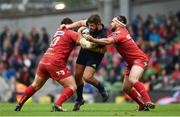 27 May 2017; Rhys Marshall of Munster is tackled by Wyn Jones, left, and Emyr Phillips of Scarlets during the Guinness PRO12 Final between Munster and Scarlets at the Aviva Stadium in Dublin. Photo by Ramsey Cardy/Sportsfile
