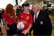 31 May 2017; British and Irish Lions head coach Warren Gatland poses for a photograph with a supporter as the British and Irish Lions squad arrive at Auckland Airport in New Zealand. Photo by Stephen McCarthy/Sportsfile