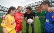 31 May 2017; SPAR FAI Primary School 5s Programme ambassador and former Republic of Ireland International Keith Andrews gives tips to players, from left, Niamh Sweeney, age 10, from Woodland NS, Letterkenny, Co Donegal, Grace Fitzpatrick Ryan, age 11, from Little Flower NS, Co Tipperary, Joshua O'Connor, age 13, from Doorus NS, Kinvara, Co Galway, and Arón Monaghan, age 12, from St Patricks NS, Co Meath, at the SPAR FAI Primary School 5s National Finals in Aviva Stadium where girls and boys from 12 counties battled it out for national honours. The 2017 SPAR FAI Primary School 5s Programme was the biggest yet as almost 28,576 children from 1,495 schools took part in county, regional and provincial blitzes nationwide. For further information please see www.spar.ie or www.faischools.ie Photo by Cody Glenn/Sportsfile