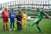 31 May 2017; SPAR FAI Primary School 5s Programme ambassador and former Republic of Ireland International Keith Andrews joined players, from left, Grace Fitzpatrick Ryan, age 11, from Little Flower NS, Co Tipperary, Arón Monaghan, age 12, from St Patricks NS, Co Meath, Niamh Sweeney, age 10, from Woodland NS, Letterkenny, Co Donegal, and Joshua O'Connor, age 13, from Doorus NS, Kinvara, Co Galway, at the SPAR FAI Primary School 5s National Finals in Aviva Stadium where girls and boys from 12 counties battled it out for national honours. The 2017 SPAR FAI Primary School 5s Programme was the biggest yet as almost 28,576 children from 1,495 schools took part in county, regional and provincial blitzes nationwide. For further information please see www.spar.ie or www.faischools.ie Photo by Cody Glenn/Sportsfile