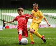 31 May 2017; Zach Lynch of Scoil an Athar Tadhg, Co Cork, in action against Kevin McCormack of Dooish NS, Co Donegal, during the SPAR FAI Primary School 5s National Finals at Aviva Stadium, in Lansdowne Rd, Dublin 4. Photo by Sam Barnes/Sportsfile