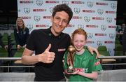 31 May 2017; SPAR FAI Primary School 5s Programme ambassador and former Republic of Ireland International Keith Andrews presents the Player of the Tournament Section A trophy to Ciara Brennan, from Drimina NS, Co Sligo, during the SPAR FAI Primary School 5s National Finals at Aviva Stadium where girls and boys from 12 counties battled it out for national honours. The 2017 SPAR FAI Primary School 5s Programme was the biggest yet as almost 28,576 children from 1,495 schools took part in county, regional and provincial blitzes nationwide. For further information please see www.spar.ie or www.faischools.ie Photo by Cody Glenn/Sportsfile