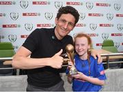 31 May 2017; SPAR FAI Primary School 5s Programme ambassador and former Republic of Ireland International Keith Andrews presents the Player of the Tournament Section C trophy to Ava Gibson Doyle, from Our Lady of Good Counsel GNS, Co Dublin, during the SPAR FAI Primary School 5s National Finals at Aviva Stadium where girls and boys from 12 counties battled it out for national honours. The 2017 SPAR FAI Primary School 5s Programme was the biggest yet as almost 28,576 children from 1,495 schools took part in county, regional and provincial blitzes nationwide. For further information please see www.spar.ie or www.faischools.ie Photo by Cody Glenn/Sportsfile