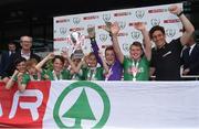 31 May 2017; SPAR FAI Primary School 5s Programme ambassador and former Republic of Ireland International Keith Andrews, far right, joins in the celebration of Scoil Mhuire Gan Smal, Co Sligo, as they lift the Section B trophy during the SPAR FAI Primary School 5s National Finals at Aviva Stadium where girls and boys from 12 counties battled it out for national honours. The 2017 SPAR FAI Primary School 5s Programme was the biggest yet as almost 28,576 children from 1,495 schools took part in county, regional and provincial blitzes nationwide. For further information please see www.spar.ie or www.faischools.ie Photo by Cody Glenn/Sportsfile