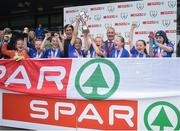31 May 2017; SPAR FAI Primary School 5s Programme ambassador and former Republic of Ireland International Keith Andrews, centre left, joins in the celebration of Our Lady of Good Counsel GNS, Co Dublin, as they lift the Section C trophy during the SPAR FAI Primary School 5s National Finals at Aviva Stadium where girls and boys from 12 counties battled it out for national honours. The 2017 SPAR FAI Primary School 5s Programme was the biggest yet as almost 28,576 children from 1,495 schools took part in county, regional and provincial blitzes nationwide. For further information please see www.spar.ie or www.faischools.ie Photo by Cody Glenn/Sportsfile