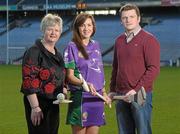 19 December 2011; At the announcement of the National Camogie Third Level Bursaries is recipient Aine Keogh, Dundalk Institute of Technology and Dunboyne Camogie Club, Co. Meath, with President of the Camogie Association Joan O’Flynn, left, and Shane D'Arcy, Comhairle Comógaíochta Ard-Oideachais. Croke Park, Dublin. Photo by Sportsfile