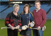 19 December 2011; At the announcement of the National Camogie Third Level Bursaries is recipient Laura Twomey, DCU and Naomh Mearnog Camogie Club, Co. Dublin, with President of the Camogie Association Joan O’Flynn, left, and Shane D'Arcy, Comhairle Comógaíochta Ard-Oideachais. Croke Park, Dublin. Photo by Sportsfile