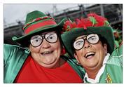 21 August 2011; Mayo supporters and sisters, from left, Tina Cunningham and Bridie Roche, from Aughamore, Mayo, on the way to the GAA Football All-Ireland Football Championship Semi-Finals. Croke Park, Dublin. Picture credit: Brian Lawless / SPORTSFILE