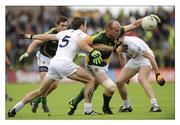 16 July 2011; Joe Sheridan, Meath, in action against Gary White, left, and Hugh McGrillen, Kildare. GAA Football All-Ireland Senior Championship Qualifier, Round 3, Meath v Kildare, Pairc Tailteann, Navan, Co. Meath. Picture credit: Pat Murphy / SPORTSFILE