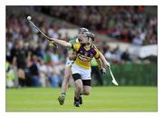 2 July 2011; PJ Nolan, Wexford, in action against Donal O'Grady, Limerick. GAA Hurling All-Ireland Senior Championship, Phase 2, Limerick v Wexford, Gaelic Grounds, Limerick. Picture credit: Matt Browne / SPORTSFILE