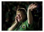 25 June 2011; Team Ireland's Amy Quinn, Bray, Co. Wicklow, waves as she calls her mum during the opening ceremony. 2011 Special Olympics World Summer Games, Opening Ceremony, Panathenaikon Stadium, Athens, Greece. Picture credit: Ray McManus / SPORTSFILE