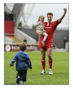 28 May 2011; Ronan O'Gara, Munster, with children Molly and Rua after the game. Celtic League Grand Final, Munster v Leinster, Thomond Park, Limerick. Picture credit: Stephen McCarthy / SPORTSFILE