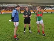 18 December 2011; Referee Syl Doyle tosses the coin between captains, John Gaffey, Garrycastle, right, and Shane Supple, St Brigid's. AIB Leinster GAA Football Senior Club Championship Final, St Brigid's, Dublin v Garrycastle, Westmeath, O'Connor Park, Tullamore, Co. Offaly. Picture credit: David Maher / SPORTSFILE