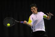 21 December 2011; James McGee, Ireland, in action against Alex Ward, Great Britain. Friendly Tennis International, Ireland v Great Britain, David Lloyd Riverview, Clonskeagh, Dublin. Picture credit: Barry Cregg / SPORTSFILE