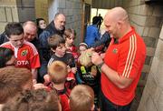 22 December 2011; Munster's John Hayes signs autographs for supporters after squad training ahead of their Celtic League game against Connacht on Monday. Munster Rugby Squad Training, Kilballyowen Park, Bruff, Co. Limerick. Picture credit: Diarmuid Greene / SPORTSFILE