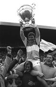 13 July 1980; Offaly captain Padraig Horan is held aloft by supporters as he lifts the cup after the Leinster Senior Hurling Championship Final match between Kilkenny and Offaly at Croke Park, Dublin. Photo by Ray McManus/Sportsfile