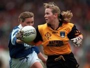 12 October 1997; Anita O'Reilly of Monaghan in action against Aine Wall of Waterford during the All-Ireland Senior Ladies Football Championship Final between Monaghan and Waterford at Croke Park in Dublin. Photo by Matt Browne/Sportsfile