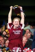 6 September 1998: Galway captain Ann Dolan lifts the cup after the All-Ireland Junior Camogie Championship Final match between Galway and Tipperary at Croke Park in Dublin. Photo by Damien Eagers/Sportsfile