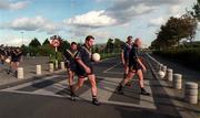 15 October 1998; Players Mark Ricciuto, Nathan Eagleton, Peter Everitt and Nigel Smart cross over the pedestrian crossing on their way to a Australia International Rules Training Session at Belfield in UCD, Dublin. Photo by David Maher/Sportsfile