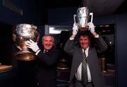 1 September 1998; An Taoiseach Bertie Ahern TD, left, and Uachtarán Chumann Lúthchleas Gael John Horan Joe McDonagh President of the GAA with the original Sam Maguire and Liam MacCarthy Cups at the official opening of the GAA Museum at Croke Park in Dublin. Photo by Ray McManus/Sportsfile